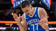 Dec 7, 2024; Seattle, Washington, USA;  Kentucky Wildcats guard Kerr Kriisa (77) reacts during the first half against the Gonzaga Bulldogs at Climate Pledge Arena. Mandatory Credit: Stephen Brashear-Imagn Images