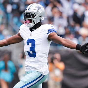Dallas Cowboys wide receiver George Pickens celebrates a touchdown during the second half against the Carolina Panthers at Bank of America Stadium.