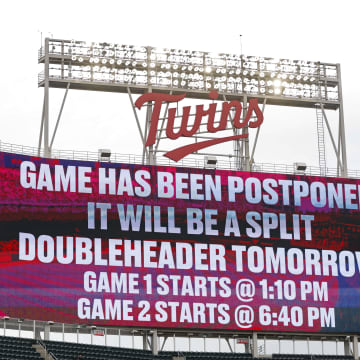 Jun 15, 2024; Minneapolis, Minnesota, USA; A sign announces the postponement of the game between the Oakland Athletics and the Minnesota Twins at Target Field. Mandatory Credit: Bruce Kluckhohn-USA TODAY Sports