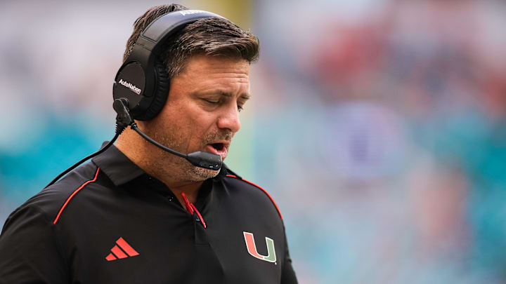 Oct 28, 2023; Miami Gardens, Florida, USA; Miami Hurricanes offensive coordinator Shannon Dawson coaches from the sideline prior to the game against the Virginia Cavaliers at Hard Rock Stadium. Mandatory Credit: Sam Navarro-Imagn Images