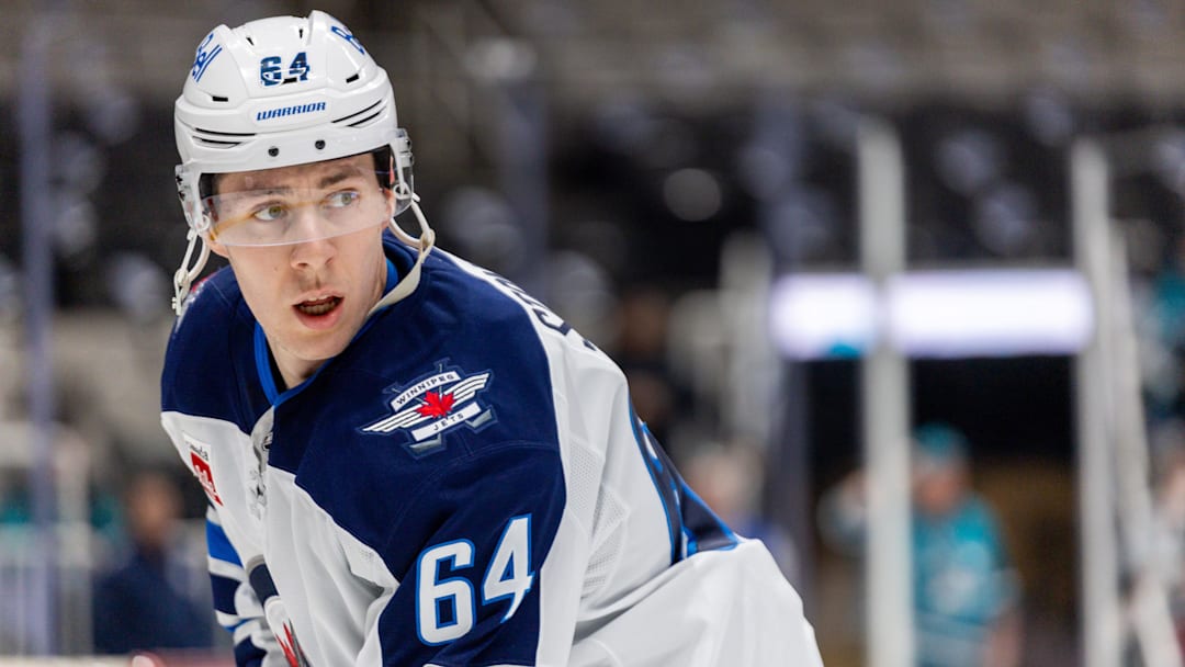 Winnipeg Jets defenceman Logan Stanley (64) before the game between the Winnipeg Jets and the San Jose Sharks at SAP Center at San Jose in 2024. 