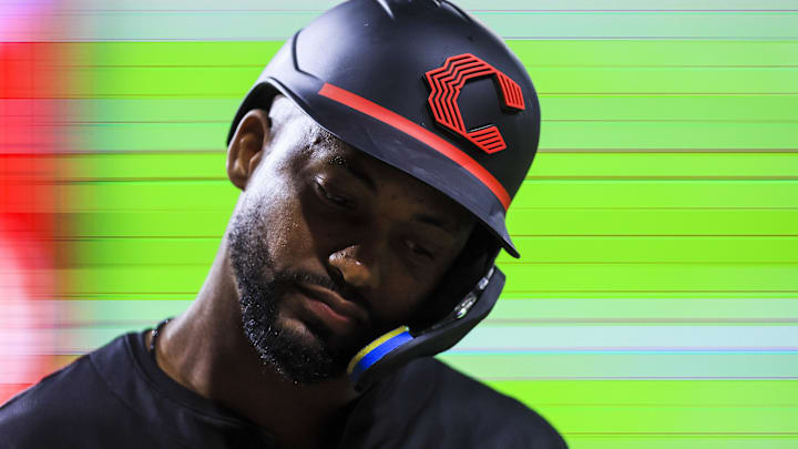 Aug 29, 2025; Cincinnati, Ohio, USA; Cincinnati Reds designated hitter Miguel Andujar (38) stands on the field during a pitching change in the eighth inning against the St. Louis Cardinals at Great American Ball Park. Mandatory Credit: Katie Stratman-Imagn Images