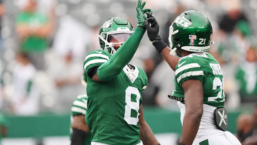 Sep 7, 2025; East Rutherford, New Jersey, USA; New York Jets safety Andre Cisco (8) and New York Jets cornerback Brandon Stephens (21) warm up before the game against the Pittsburgh Steelers at MetLife Stadium. Mandatory Credit: Vincent Carchietta-Imagn Images