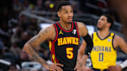 Apr 14, 2024; Indianapolis, Indiana, USA; Atlanta Hawks guard Dejounte Murray (5) in the first half against the Indiana Pacers at Gainbridge Fieldhouse.