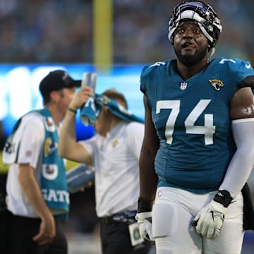 Jacksonville Jaguars offensive tackle Cam Robinson (74) reacts to a catch being confirmed in favor of the Jacksonville Jaguars during the second quarter of a preseason matchup Saturday, Aug. 26, 2023 at EverBank Stadium in Jacksonville, Fla. [Corey Perrine/Florida Times-Union]