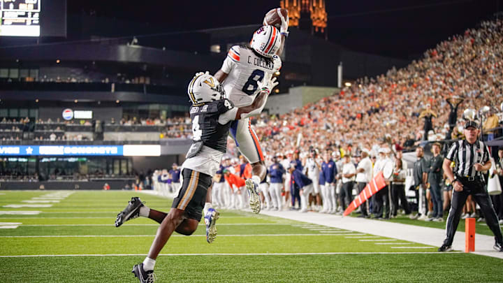 Auburn wide receiver Cam Coleman (8) pulls down a pass for a two point conversion against Vanderbilt during the fourth quarter at FirstBank Stadium in Nashville, Tenn., Saturday, Nov. 8, 2025.