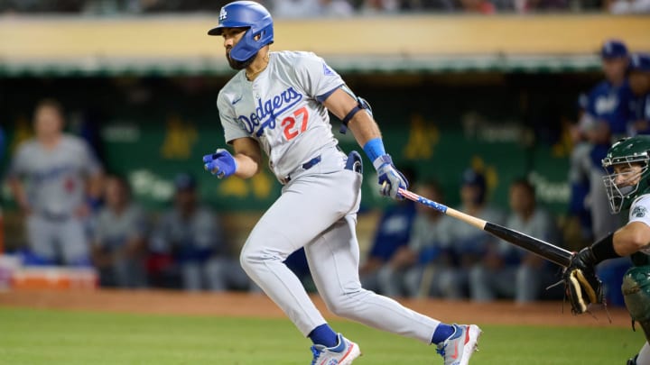 Aug 2, 2024; Oakland, California, USA; Los Angeles Dodgers outfielder Amed Rosario (27) bats against the Oakland Athletics during the seventh inning at Oakland-Alameda County Coliseum.