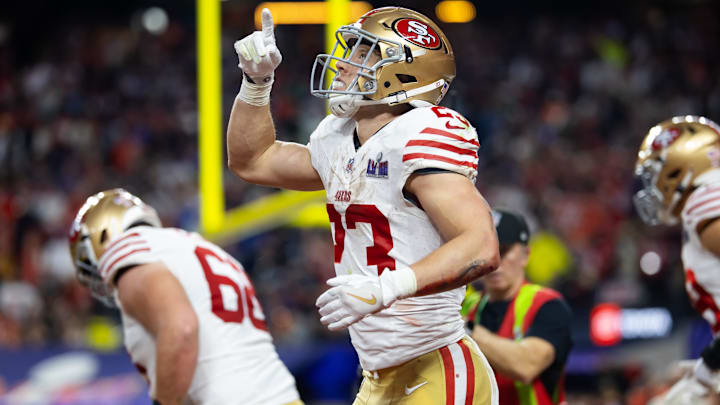 Feb 11, 2024; Paradise, Nevada, USA; San Francisco 49ers running back Christian McCaffrey (23) celebrates after scoring a touchdown in the first half of Super Bowl LVIII at Allegiant Stadium.