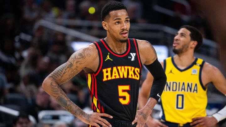 Apr 14, 2024; Indianapolis, Indiana, USA; Atlanta Hawks guard Dejounte Murray (5) in the first half against the Indiana Pacers at Gainbridge Fieldhouse. Mandatory Credit: Trevor Ruszkowski-USA TODAY Sports