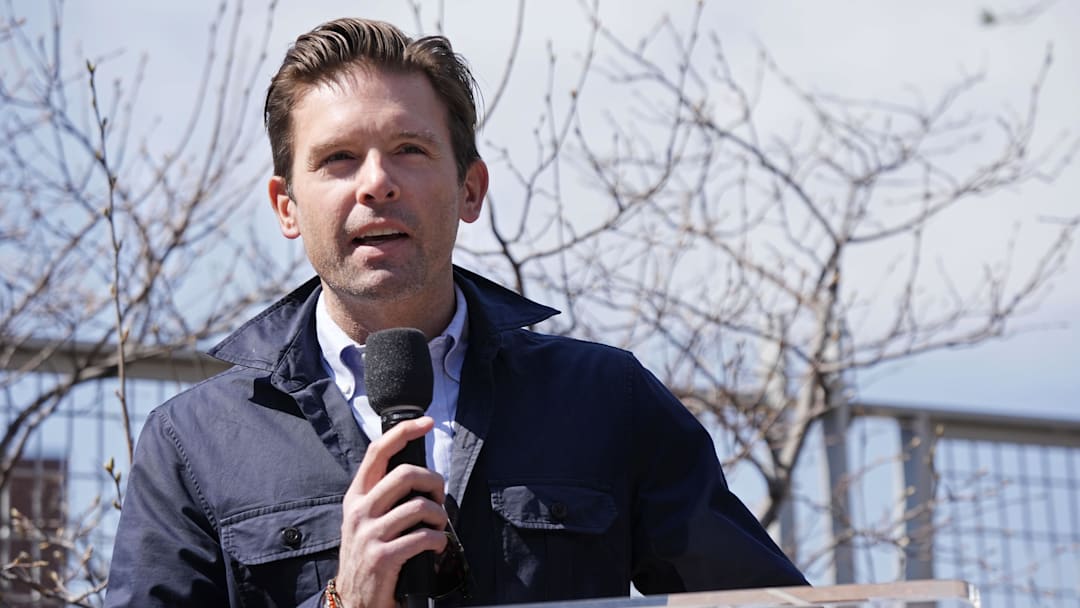 Apr 13, 2025; Minneapolis, Minnesota, USA; Minnesota Twins executive chair Joe Pohlad addresses the crowd as the team unveils a statue of Joe Mauer before the game with the Detroit Tigers at Target Field. Mandatory Credit: Bruce Kluckhohn-Imagn Images