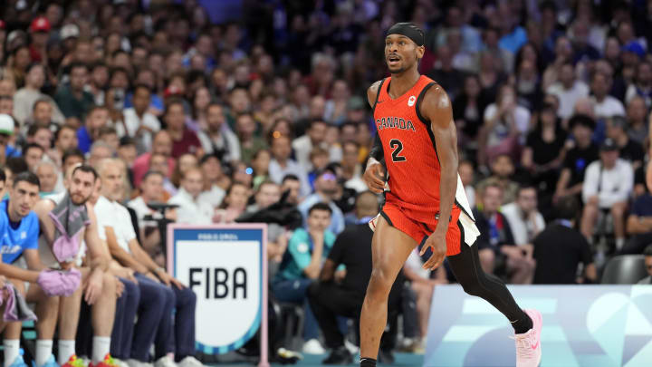 Jul 27, 2024; Villeneuve-d'Ascq, France; Canada guard Shai Gilgeous-Alexander (2) controls the ball against Greece in the first quarter during the Paris 2024 Olympic Summer Games at Stade Pierre-Mauroy. Mandatory Credit: John David Mercer-USA TODAY Sports