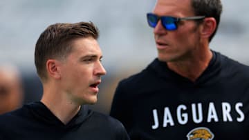 Jacksonville Jaguars General Manager James Gladstone, left, and Tony Boselli, Jacksonville Jaguars Executive Vice President of football operations walk on the field before an NFL football matchup at EverBank Stadium, Sunday, Sept. 21, 2025, in Jacksonville, Fla. The Jaguars defeated the Texans 17-10.