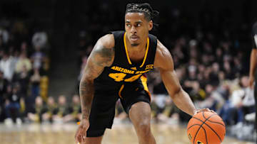 Jan 28, 2025; Boulder, Colorado, USA; Arizona State Sun Devils guard Adam Miller (44) controls the ball in the first half against the Colorado Buffaloes at CU Events Center. Mandatory Credit: Ron Chenoy-Imagn Images