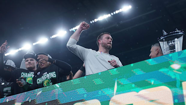 Dec 7, 2024; Indianapolis, IN, USA; Oregon Ducks head coach Dan Lanning celebrates defeating the Penn State Nittany Lions to 