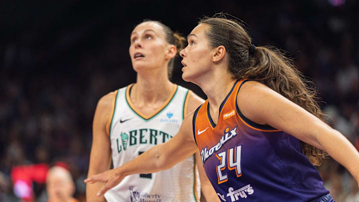 Aug 30, 2025; Phoenix, Arizona, USA; Phoenix Mercury forward Kathryn Westbeld (24) and New York Liberty forward Stephanie Talbot (6) position for a rebound during a free throw attempt in the second half of a game at Footprint Center. Mandatory Credit: Allan Henry-Imagn Images