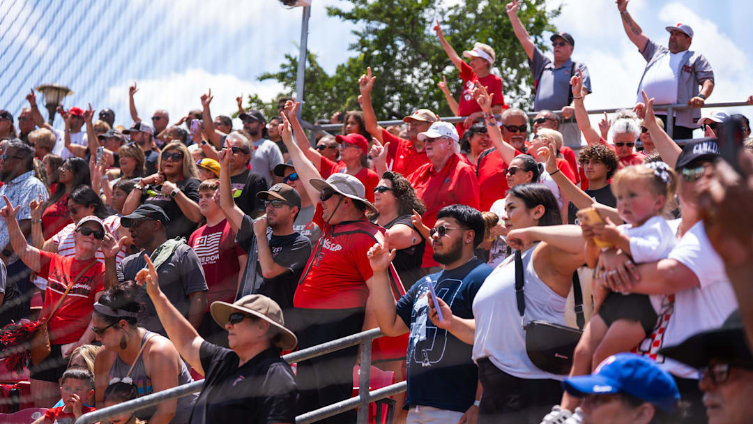 Texas Tech fans cheer during a welcome back event for the Red Raider softball team at Rocky Johnson Field in Lubbock, Texas, on Friday, June 7, 2025.