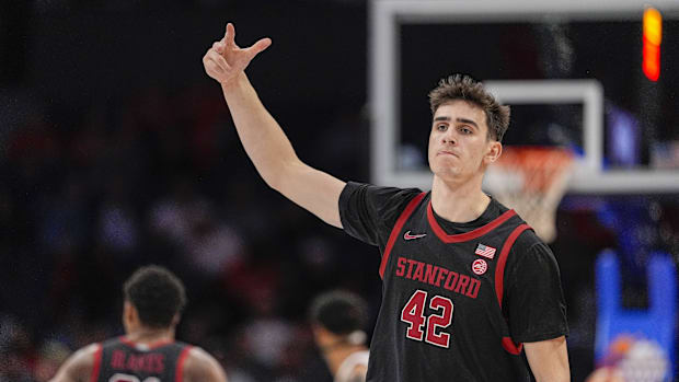 Mar 13, 2025; Charlotte, NC, USA; Stanford Cardinal forward Maxime Raynaud (42) after a dunk against the Louisville Cardinals
