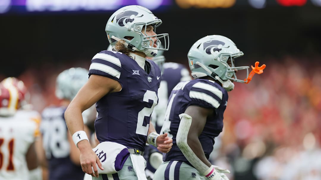 Aug 23, 2025; Dublin, IRELAND; Kansas State quarterback Avery Johnson scores a touchdown during the Aer Lingus Classic between Iowa State and Kansas State at Aviva Stadium. Mandatory Credit: Laszlo Geczo/INPHO via Imagn Images