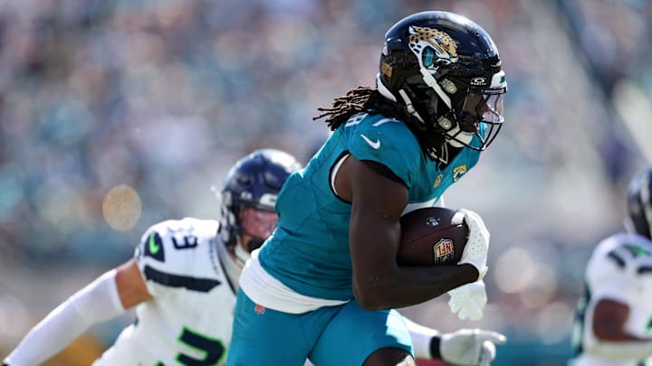 Thomas Jr. scores a touchdown that is called back for a flag during the second half against the Seattle Seahawks.