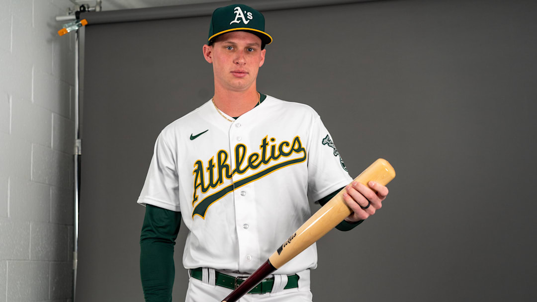 Feb 23, 2023; Mesa, AZ, USA; Oakland Athletics infielder Logan Davidson (49) poses for a portrait during spring training photo day at HoHoKam Stadium. Mandatory Credit: Allan Henry-Imagn Images