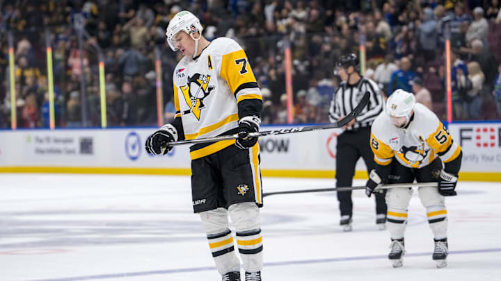 Oct 26, 2024; Vancouver, British Columbia, CAN; Pittsburgh Penguins defenseman Kris Letang (58) and forward Evgeni Malkin (71) react after losing to the Vancouver Canucks at Rogers Arena. Oct 26, 2024; Vancouver, British Columbia, CAN; Pittsburgh Penguins defenseman Kris Letang (58) and forward Evgeni Malkin (71) react after losing to the Vancouver Canucks at Rogers Arena.