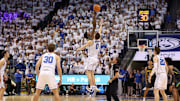Feb 20, 2024; Provo, Utah, USA; Baylor Bears center Yves Missi (21) and Brigham Young Cougars forward Noah Waterman (0) jump the ball to start the game at Marriott Center. Mandatory Credit: Rob Gray-USA TODAY Sports