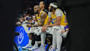 Jan 27, 2025; Charlotte, North Carolina, USA; Los Angeles Lakers forward Anthony Davis (3) and Los Angeles Lakers forward LeBron James (23) during a timeout against the Charlotte Hornets during the first quarter at the Spectrum Center. Mandatory Credit: Jim Dedmon-Imagn Images