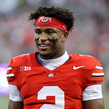 Sep 13, 2025; Columbus, Ohio, USA;  Ohio State Buckeyes safety Caleb Downs (2) reacts during the first quarter against the Ohio Bobcats during the second half at Ohio Stadium. Mandatory Credit: Joseph Maiorana-Imagn Images