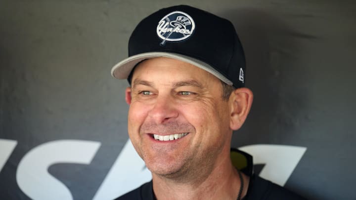 Jun 1, 2024; San Francisco, California, USA; New York Yankees manager Aaron Boone (17) talks to the media in the dugout before the game between the San Francisco Giants and the New York Yankees at Oracle Park. Mandatory Credit: Robert Edwards-USA TODAY Sports