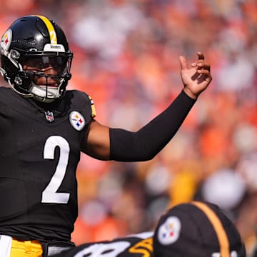 Sep 15, 2024; Denver, Colorado, USA; Pittsburgh Steelers quarterback Justin Fields (2) during the first quarter against the Denver Broncos at Empower Field at Mile High. Mandatory Credit: Ron Chenoy-Imagn Images