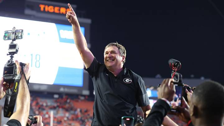 Oct 11, 2025; Auburn, Alabama, USA;  Georgia Bulldogs head coach Kirby Smart celebrates after the Bulldogs beat the Auburn Tigers at Jordan-Hare Stadium. Mandatory Credit: John Reed-Imagn Images