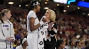 LSU Lady Tigers head coach Kim Mulkey talks with forward Sa'Myah Smith against the Florida Gators.