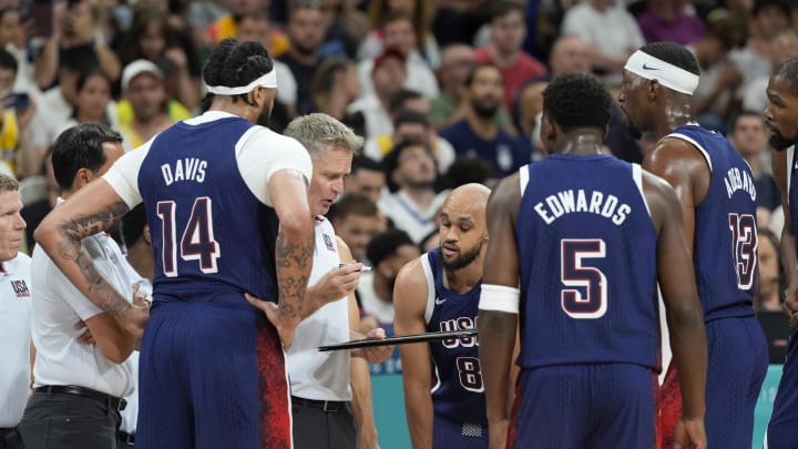 Jul 28, 2024; Villeneuve-d'Ascq, France; United States head coach Steve Kerr talks to the team during a timeout  in the first quarter against Serbia during the Paris 2024 Olympic Summer Games at Stade Pierre-Mauroy. 