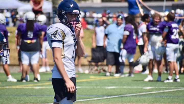 Arlington quarterback Leyton Martin participates in PLU 11v11 Football Showcase on Wednesday in Parkland.