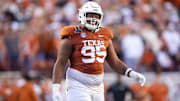 Dec 21, 2024; Austin, Texas, USA; Texas Longhorns defensive lineman Alfred Collins (95) against the Clemson Tigers during the CFP National playoff first round at Darrell K Royal-Texas Memorial Stadium. Mandatory Credit: Mark J. Rebilas-Imagn Images