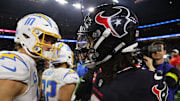 Houston Texans quarterback C.J. Stroud and Los Angeles Chargers quarterback Justin Herbert after defeating the Los Angeles Chargers in an AFC wild card game at NRG Stadium. 
