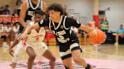 Taylen Kinney (0) dribbles by a defender during an AAU basketball game July 4, 2023, at the Nike EYBL Peach Jam in North Augusta, S.C. A Newport native, Kinney is a Class of 2026 recruit.