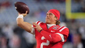 Dart warms up before the TaxSlayer Gator Bowl.