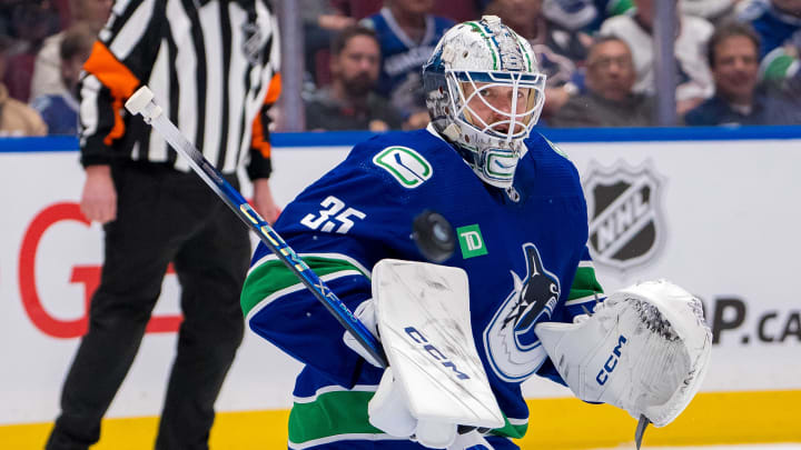 Apr 16, 2024; Vancouver, British Columbia, CAN; Vancouver Canucks goalie Thatcher Demko (35) makes a save against the Calgary Flames in the second period at Rogers Arena. Mandatory Credit: Bob Frid-USA TODAY Sports