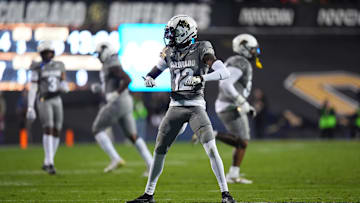 Oct 26, 2024; Boulder, Colorado, USA; Colorado Buffaloes cornerback Travis Hunter (12) reacts to a play in the second quarter against the Cincinnati Bearcats at Folsom Field. Mandatory Credit: Ron Chenoy-Imagn Images