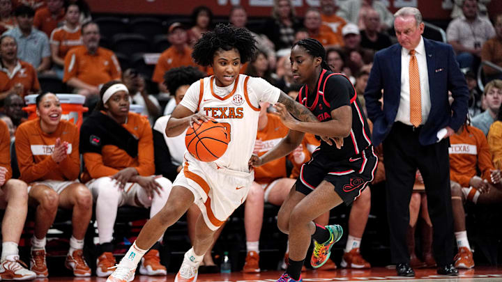 Feb 26, 2026; Austin, Texas, USA; Texas Longhorns guard Rori Harmon (3) drives the ball against Georgia Bulldogs guard Dani Carnegie (3) during the first quarter at Moody Center. Mandatory Credit: Dustin Safranek-Imagn Images