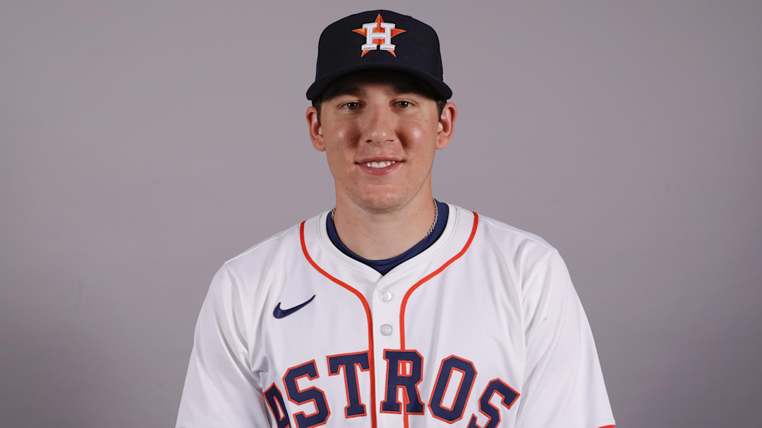 Feb 20, 2025; West Palm Beach, FL, USA;  Houston Astros right hand pitcher AJ Blubaugh poses for a photo at the Houston Astros media day