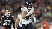 Nov 16, 2025; Cleveland, Ohio, USA; Baltimore Ravens tight end Mark Andrews (89) runs for a touchdown during the fourth quarter against the Cleveland Browns at Huntington Bank Field. Mandatory Credit: Scott Galvin-Imagn Images