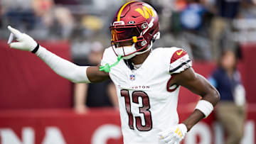 Sep 29, 2024; Glendale, Arizona, USA; Washington Commanders cornerback Emmanuel Forbes Jr. (13) against the Arizona Cardinals at State Farm Stadium. Mandatory Credit: Mark J. Rebilas-Imagn Images