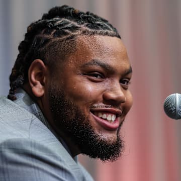 Arkansas Razorbacks defensive lineman Cam Ball answers questions from the media during the SEC Media Days at Omni Atlanta Hotel. 