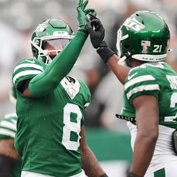 Sep 7, 2025; East Rutherford, New Jersey, USA; New York Jets safety Andre Cisco (8) and New York Jets cornerback Brandon Stephens (21) warm up before the game against the Pittsburgh Steelers at MetLife Stadium. Mandatory Credit: Vincent Carchietta-Imagn Images