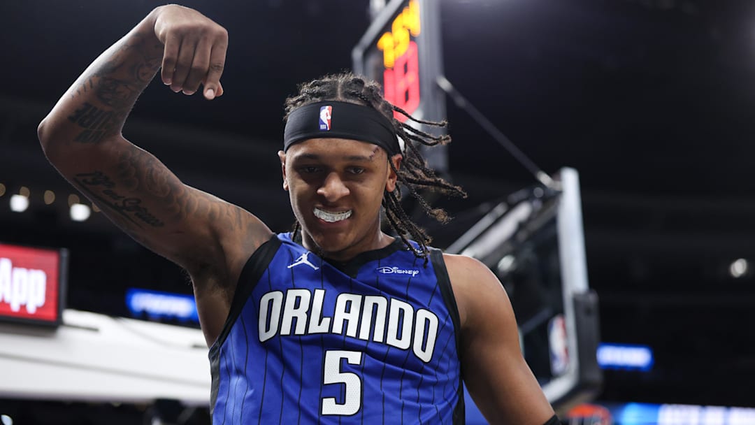 Apr 15, 2025; Orlando, Florida, USA; Orlando Magic forward Paolo Banchero (5) reacts after basket against the Atlanta Hawks in the fourth quarter at Kia Center. Mandatory Credit: Nathan Ray Seebeck-Imagn Images