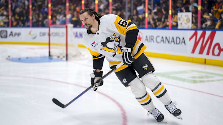 Oct 26, 2024; Vancouver, British Columbia, CAN; Pittsburgh Penguins defenseman Erik Karlsson (65) skates during warm up prior to a game against the Vancouver Canucks at Rogers Arena. Mandatory Credit: Bob Frid-Imagn Images