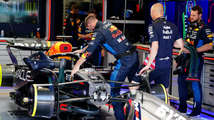 May 4, 2024; Miami Gardens, Florida, USA; Crewmembers work on the Red Bull Racing driver Max Verstappen (1) car in the paddock before the F1 Sprint Race at Miami International Autodrome. Mandatory Credit: John David Mercer-USA TODAY Sports