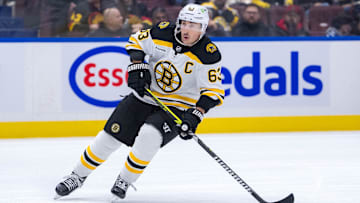 Dec 14, 2024; Vancouver, British Columbia, CAN; Boston Bruins forward Brad Marchand (63) skates against the Vancouver Canucks during the third period at Rogers Arena. Mandatory Credit: Bob Frid-Imagn Images